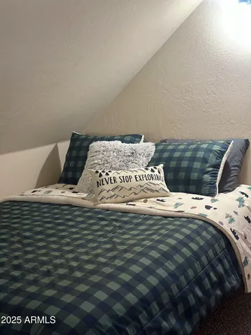 a sign that is sitting on the side of a building