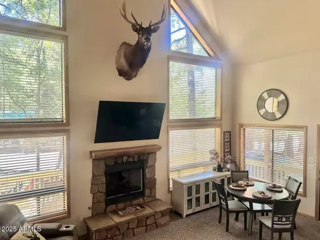 a kitchen with a sink cabinets and a window