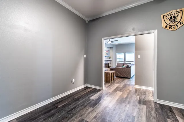 a bedroom with a bed and a view of bedroom