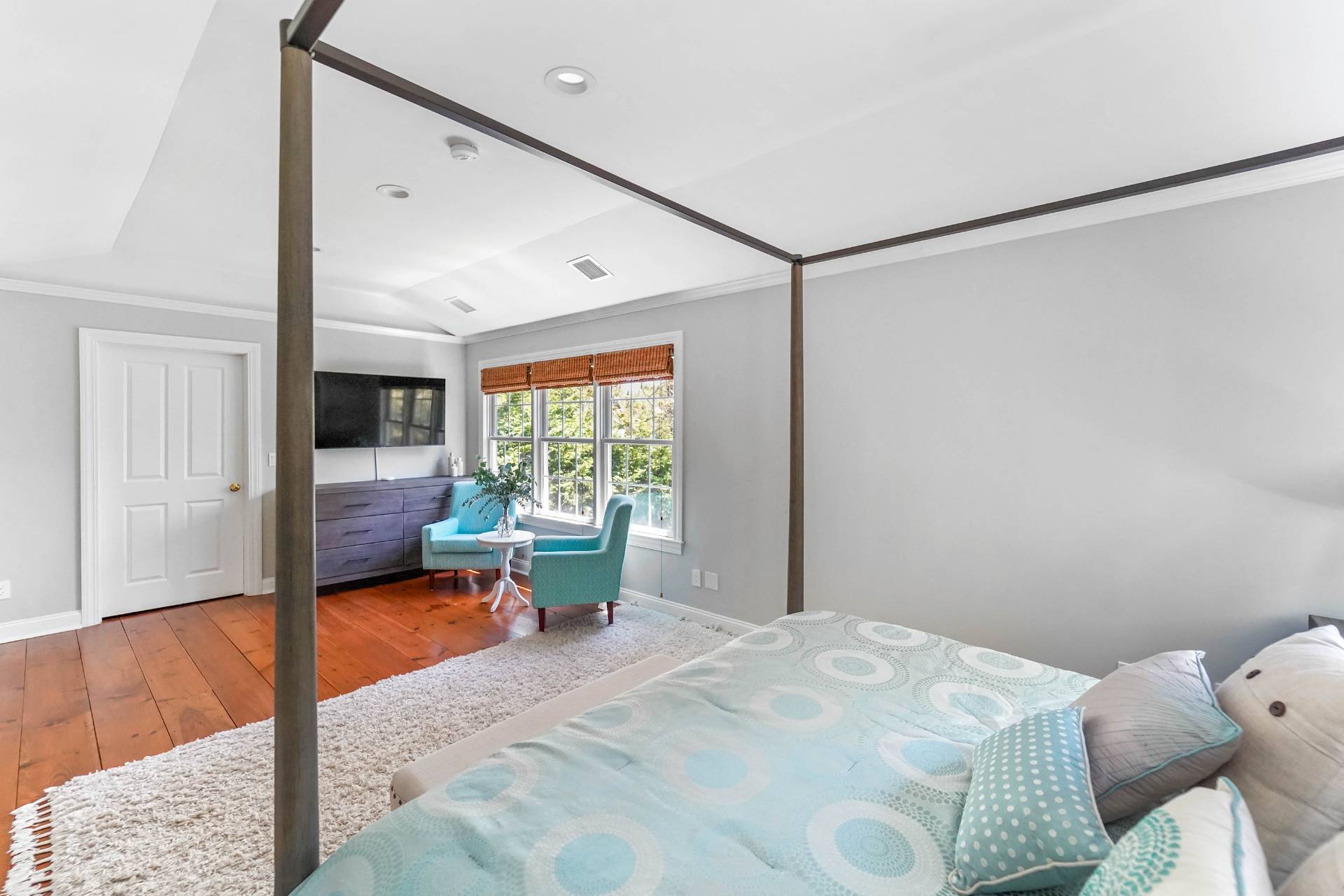39 A Foster Road Quogue, NY 11959 - Photo 12 of 16 a bed room with a bed and a window