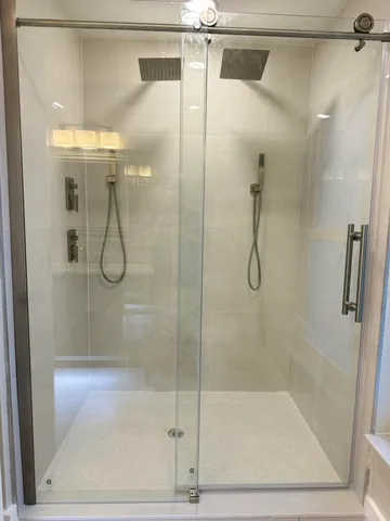 a bathroom with a sink vanity and toilet