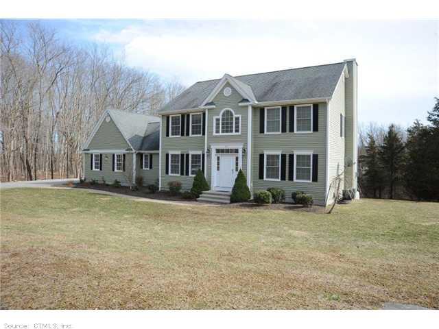 429 Norwich Road Salem, CT 06420 - Photo 1 of 1 a view of a yard in front of a house with a fountain