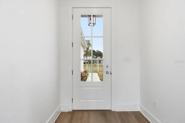 a view of front door with hallway