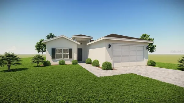 a front view of a house with a garden and yard