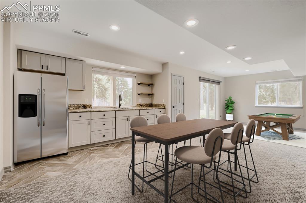 16755 Winchester Road Colorado Springs, CO 80908 - Photo 36 of 50 Virtually staged wet bar and game room