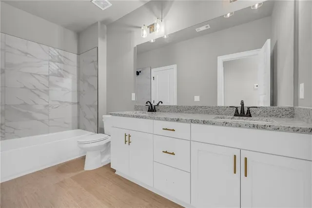 a swimming pool with outdoor seating and yard