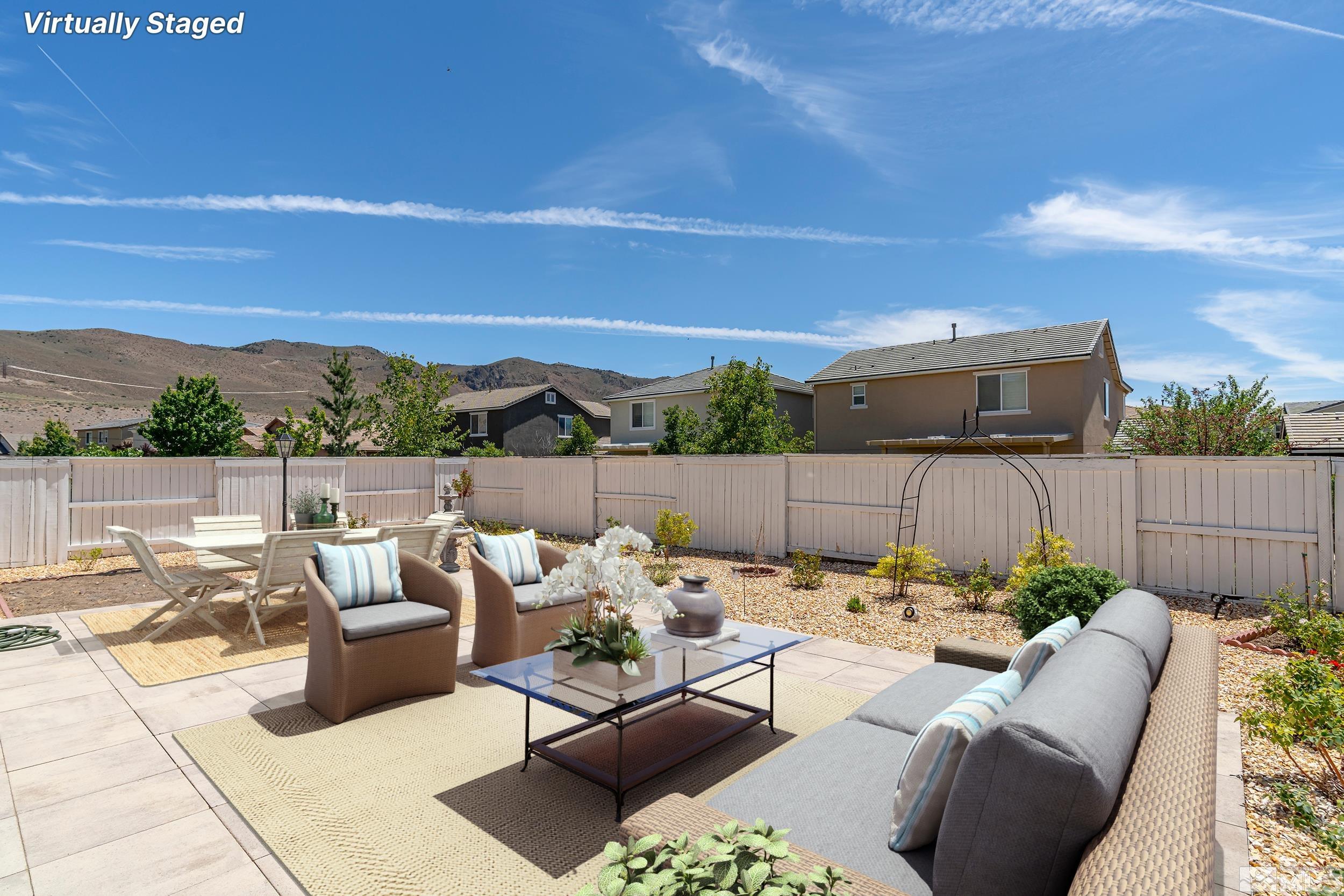 3080 Show Jumper Lane Reno, NV 89521 - Photo 26 of 40 a view of a patio with couches chairs and a table