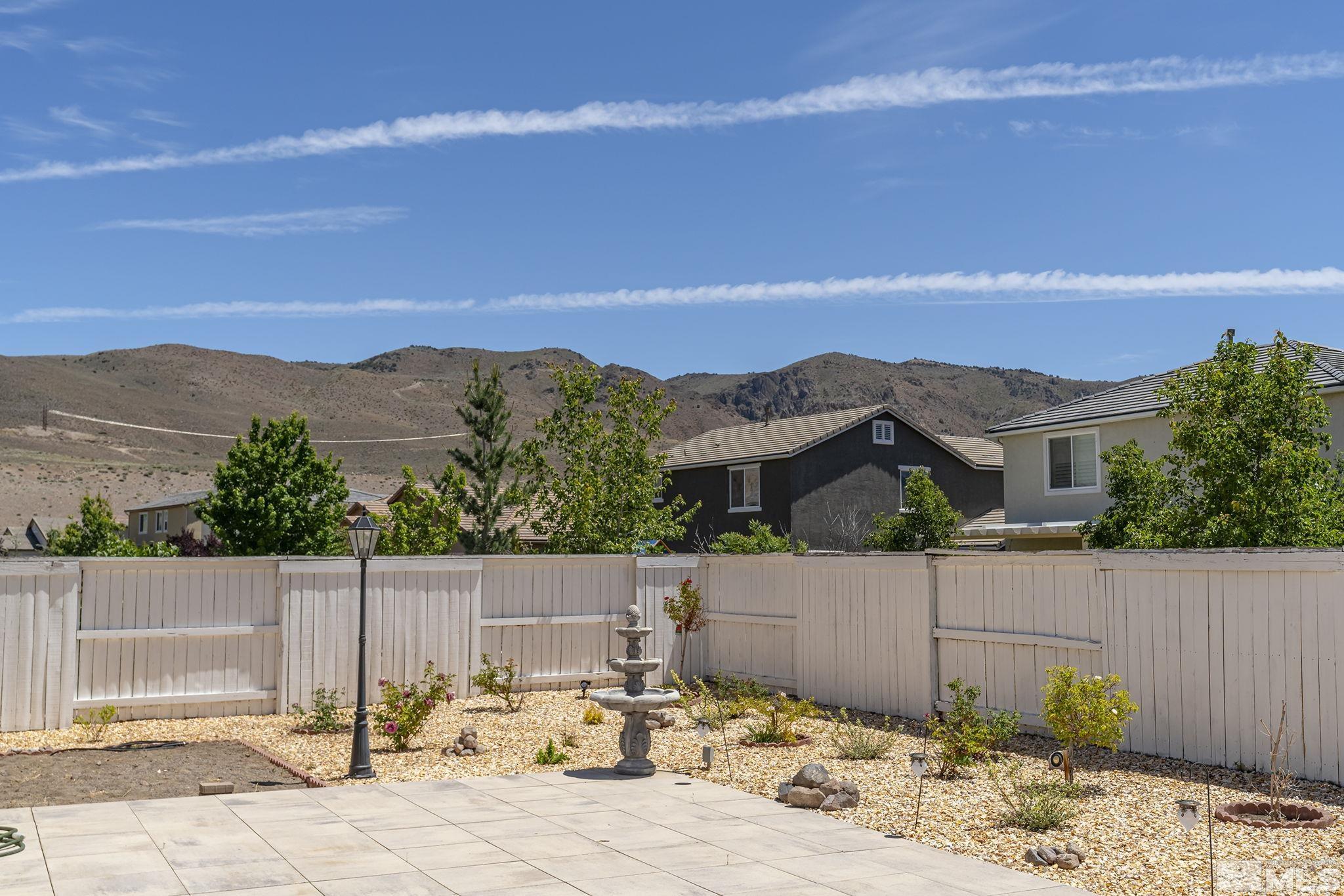 3080 Show Jumper Lane Reno, NV 89521 - Photo 30 of 40 a view of a terrace with a garden