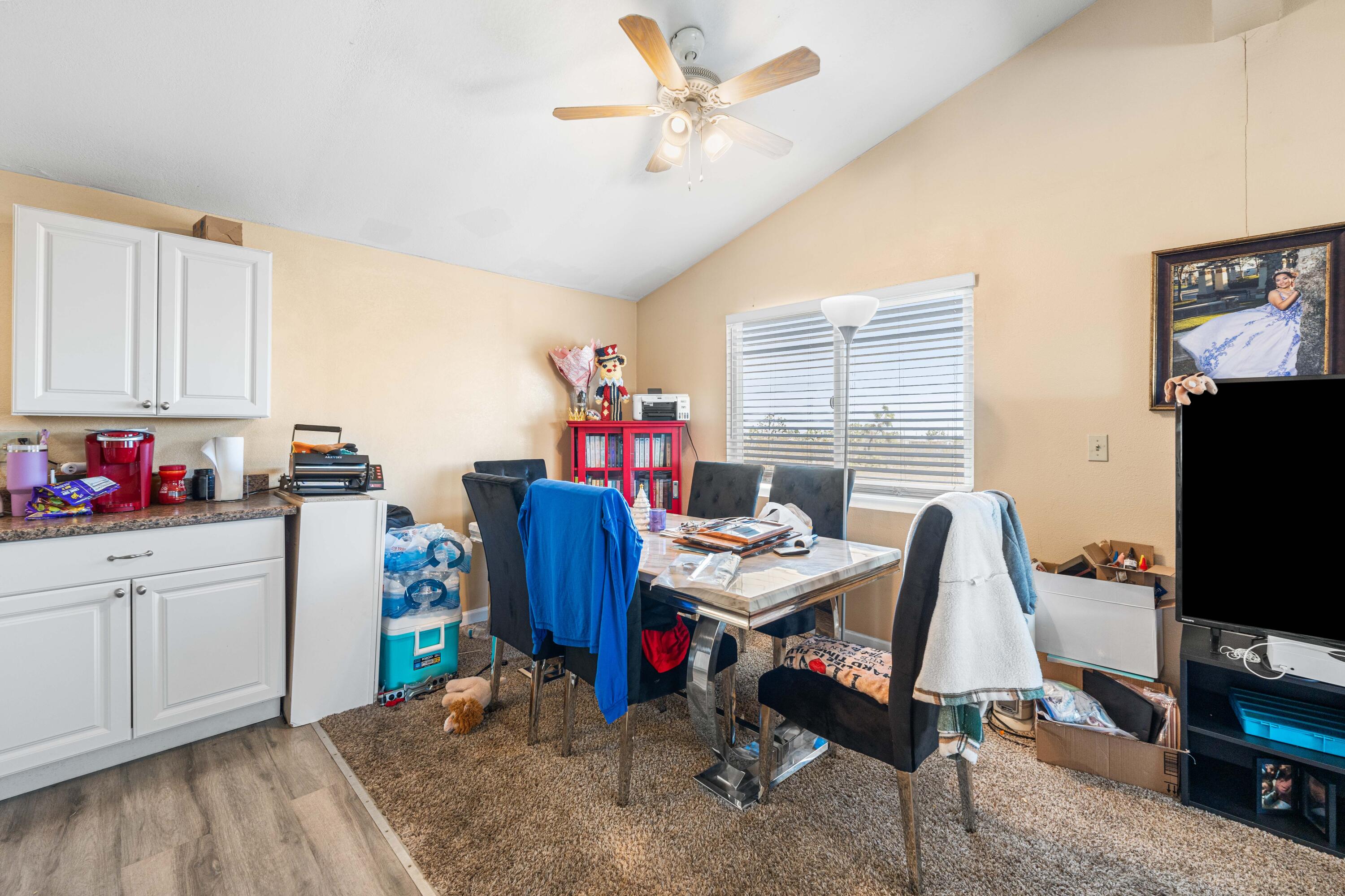4824 Sacramento Road Phelan, CA 92371 - Photo 11 of 28 a view of a workspace with furniture and a window