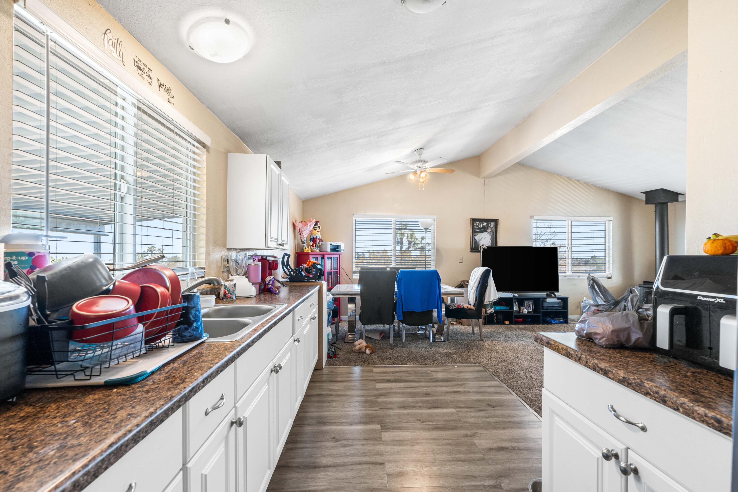 4824 Sacramento Road Phelan, CA 92371 - Photo 14 of 28 a kitchen with granite countertop lots of counter top space