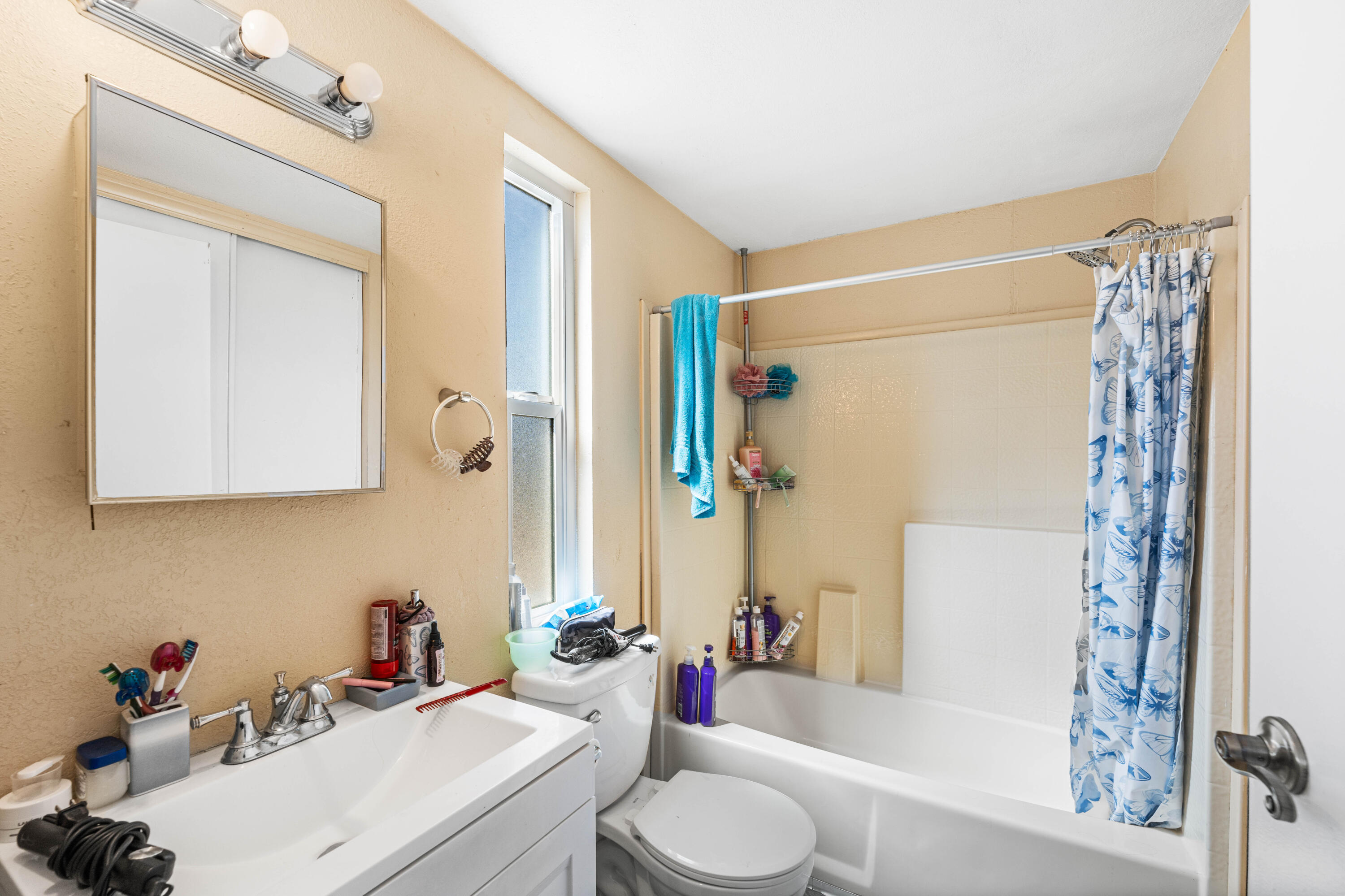 4824 Sacramento Road Phelan, CA 92371 - Photo 17 of 28 a bathroom with a sink toilet and shower