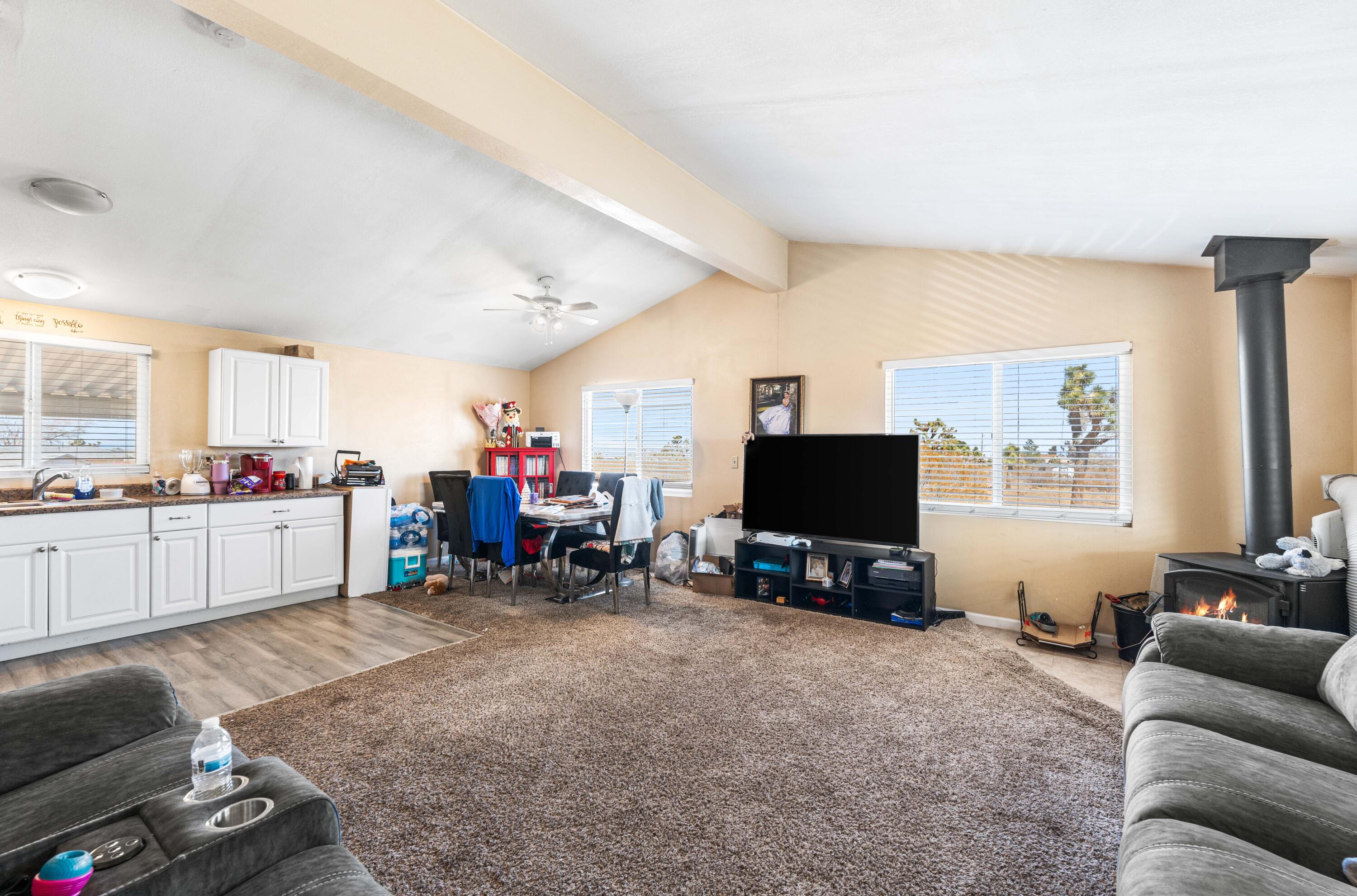 4824 Sacramento Road Phelan, CA 92371 - Photo 7 of 28 a living room with furniture and a flat screen tv