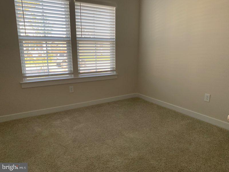 37354 Kestrel Way Ocean View, DE 19970 - Photo 10 of 18 an empty room with a window