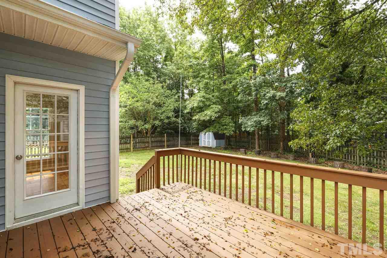 5205 Covington Bend Drive Raleigh, NC 27613 - Photo 9 of 16 The deck overlooks the private/FENCED yard. There's a storage shed too for all you extra storage needs. One of the best lots in the neighborhood - this home backs up to a tree preservation area!