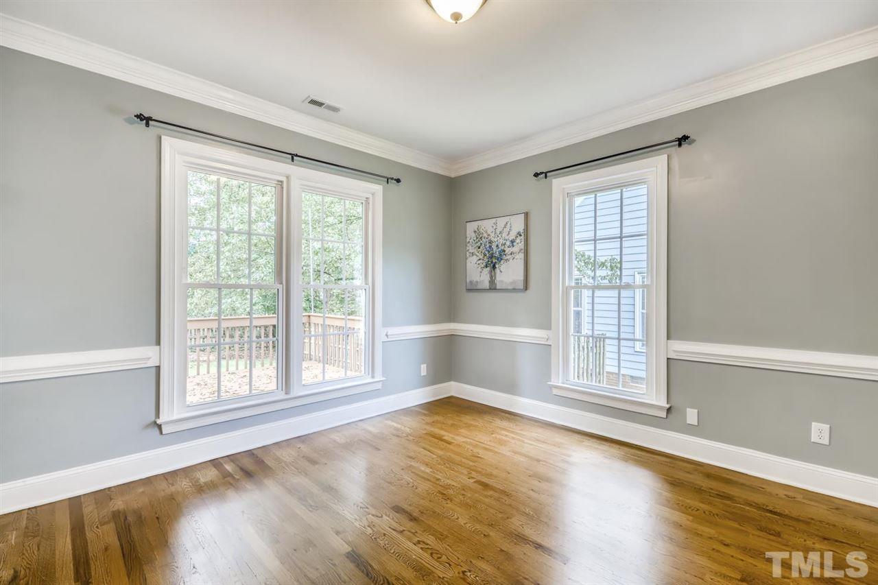 5205 Covington Bend Drive Raleigh, NC 27613 - Photo 3 of 16 Gleaming hardwoods extend throughout most of the main level. Bright dining room - plenty of room for quiet family dinners or entertaining friends. This room could also be an extension of the huge family room!