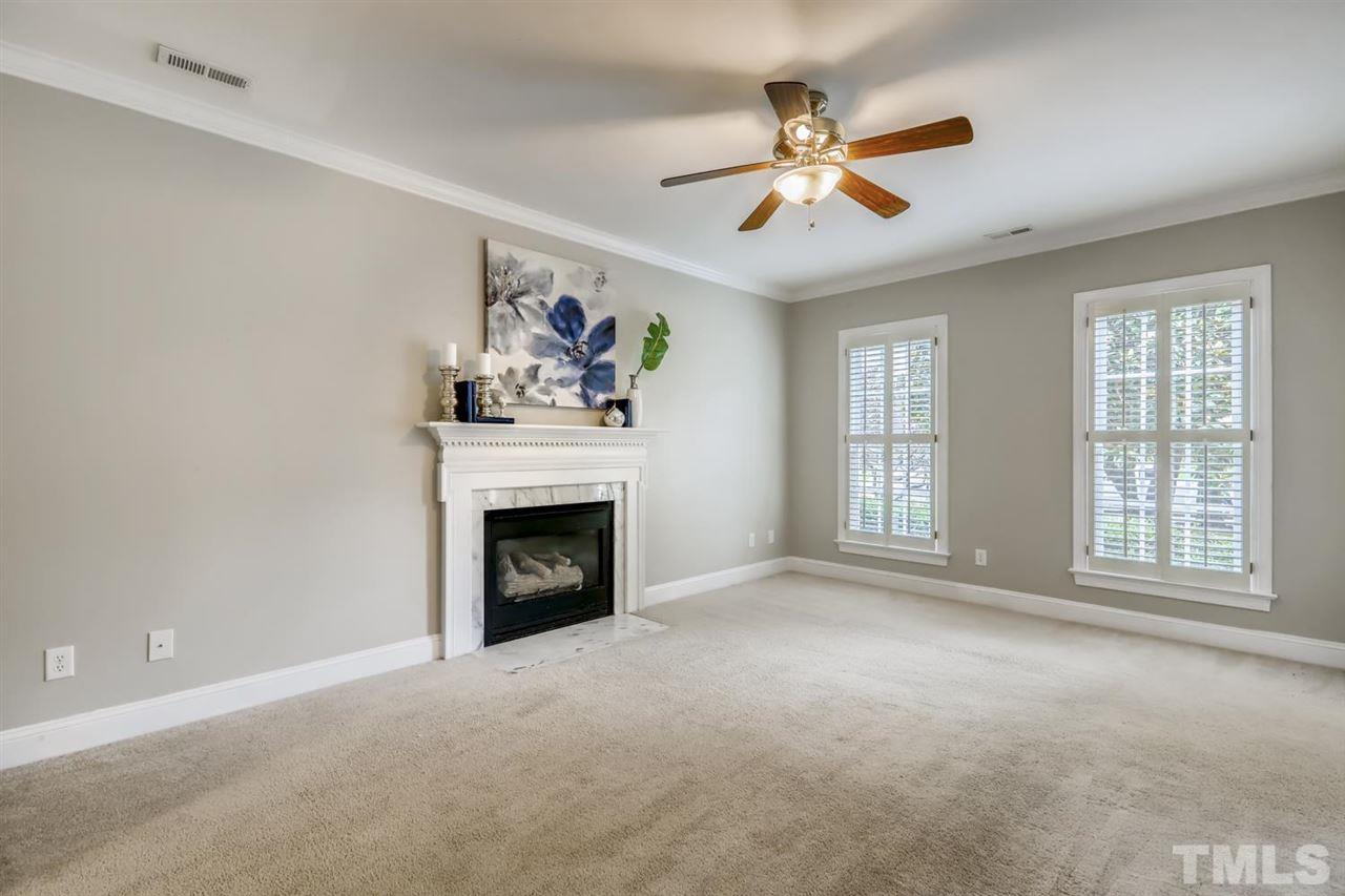 5205 Covington Bend Drive Raleigh, NC 27613 - Photo 5 of 16 The family room is open to the dining room. The window shutters add privacy but let in tons of natural light too!