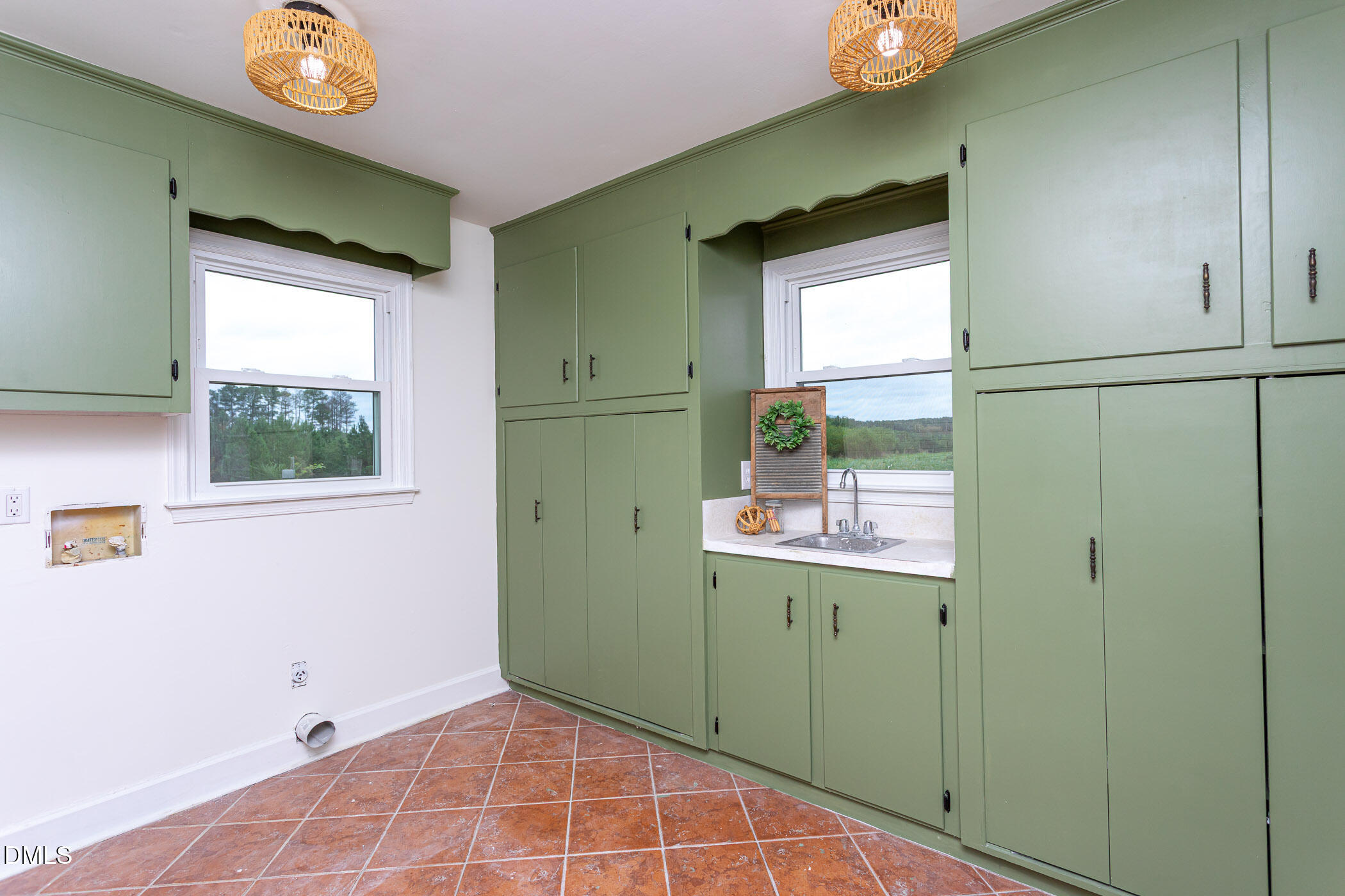 641 Rocky Ford Road Louisburg, NC 27549 - Photo 13 of 40 a bathroom with a sink and a mirror