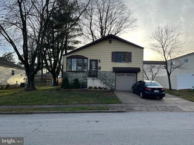 a house view with a garden space