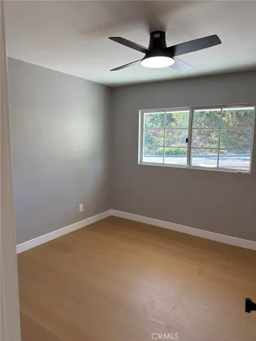 a bathroom with a sink and a window