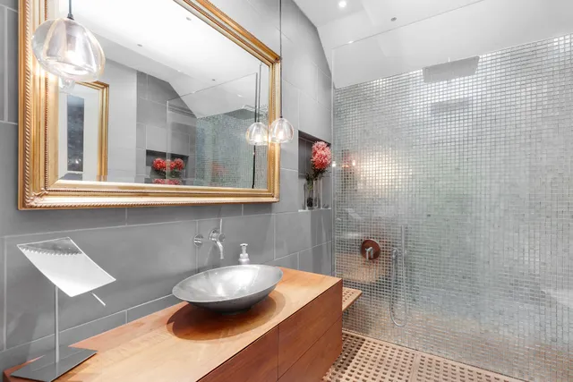 a dining room with furniture and a floor to ceiling window