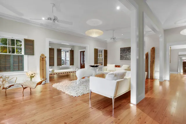 a kitchen with a sink a stove and cabinets