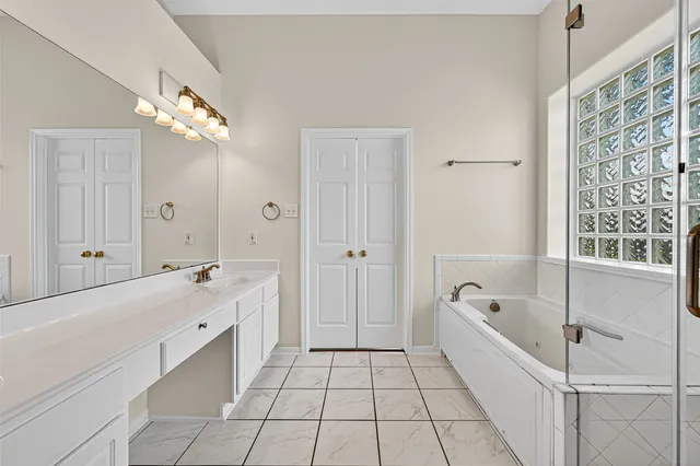 a view of a backyard with a tree