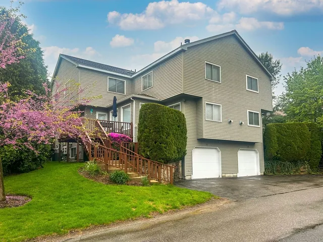 a house view with a garden space