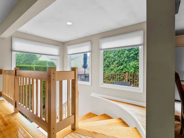 a view of a room with balcony and furniture