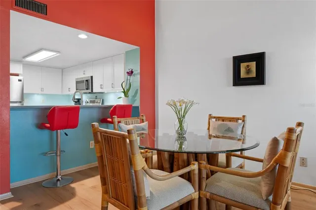 a bedroom with a bed and cabinets