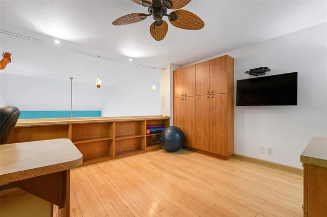 an aerial view of a house with a yard and a garden