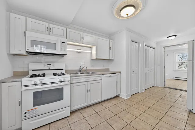a bathroom with a sink a vanity and a mirror