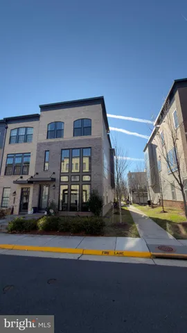 a view of swimming pool with outdoor seating and yard