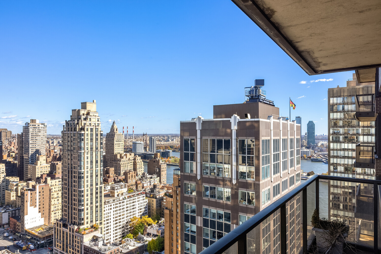 100 United Nations Plaza, Unit 35E Manhattan, NY 10017 - Photo 10 of 11 a view of a city from a balcony