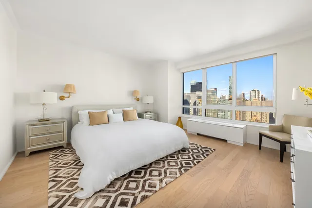 a kitchen with stainless steel appliances granite countertop a stove and a refrigerator