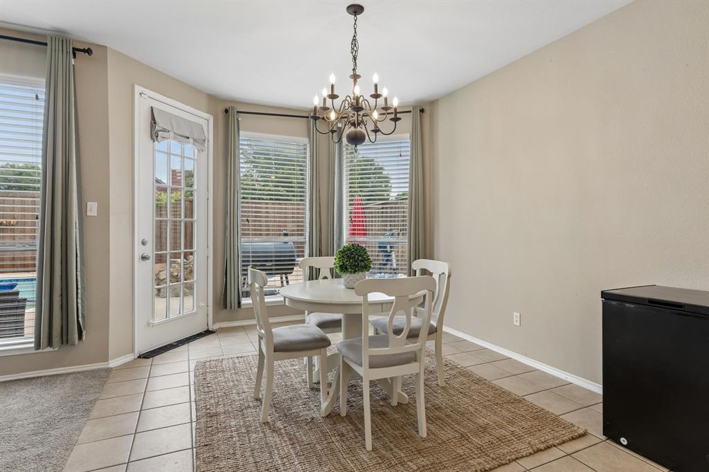 129 Timberbluff Lane Murphy, TX 75094 - Photo 12 of 34 a view of a dining room with furniture and window