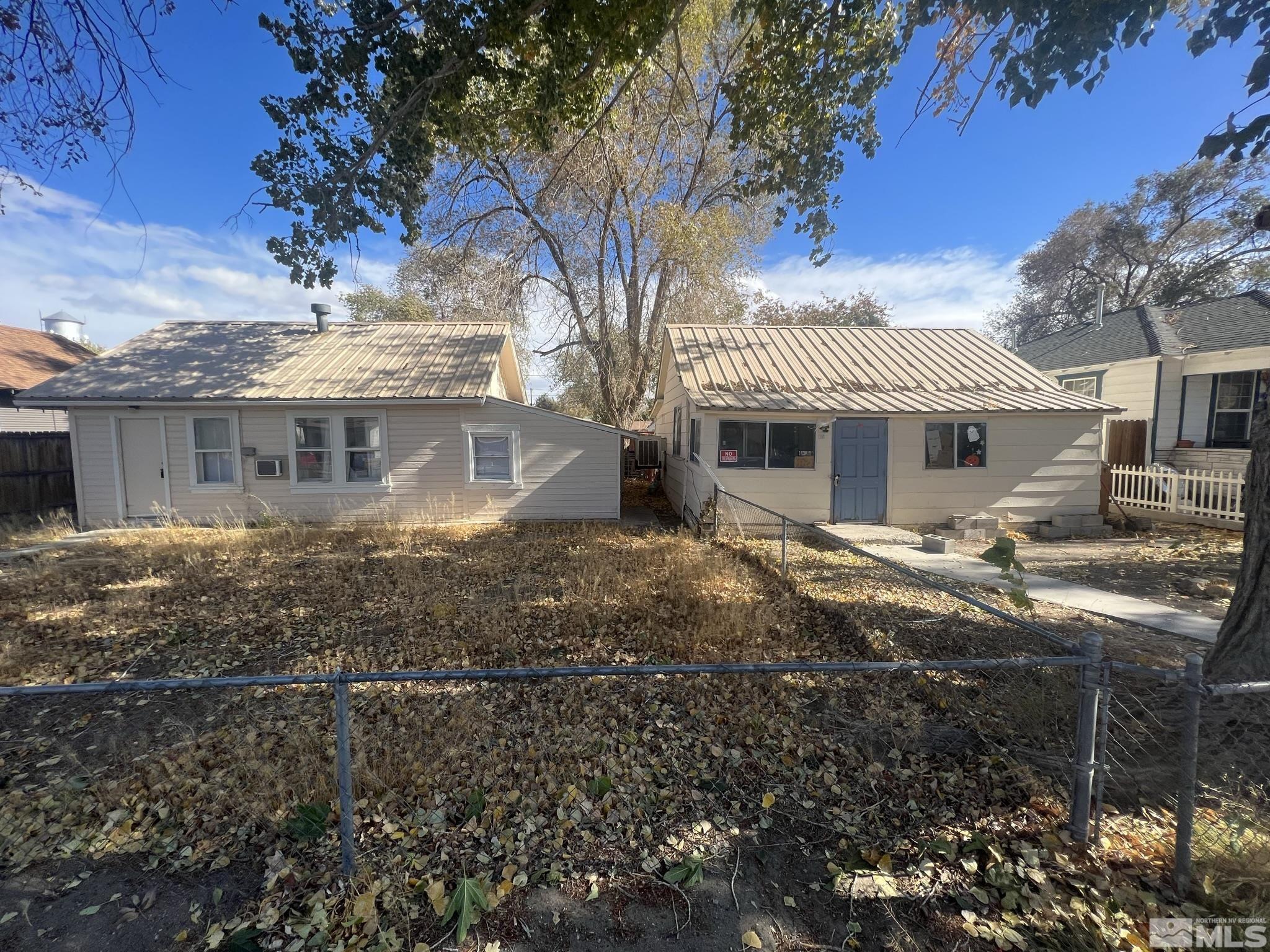 220 South Nevada Street, Unit 3 Yerington, NV 89447 - Photo 1 of 39 a view of a house with a yard