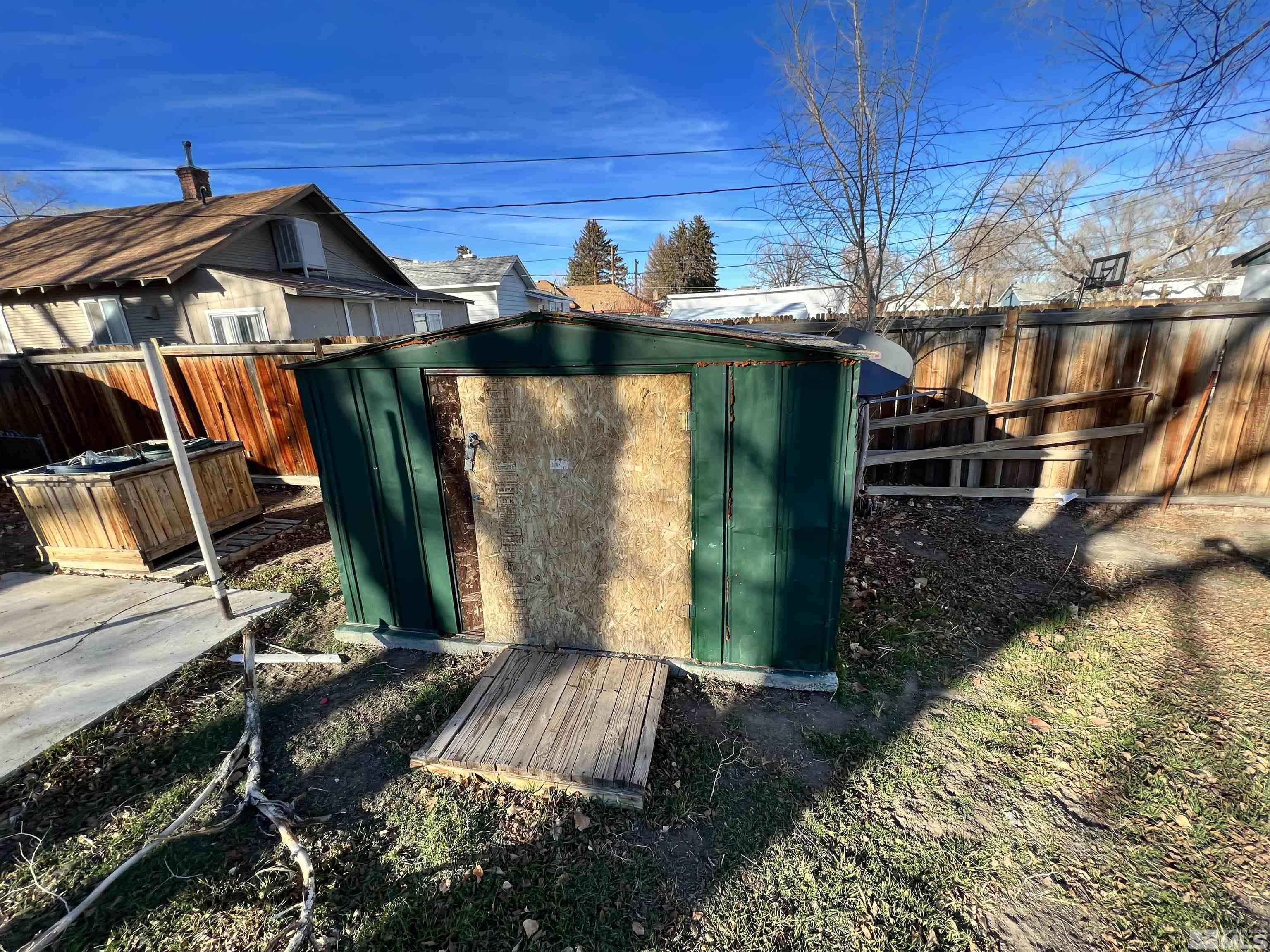 220 South Nevada Street, Unit 3 Yerington, NV 89447 - Photo 18 of 39 a view of a house with a yard