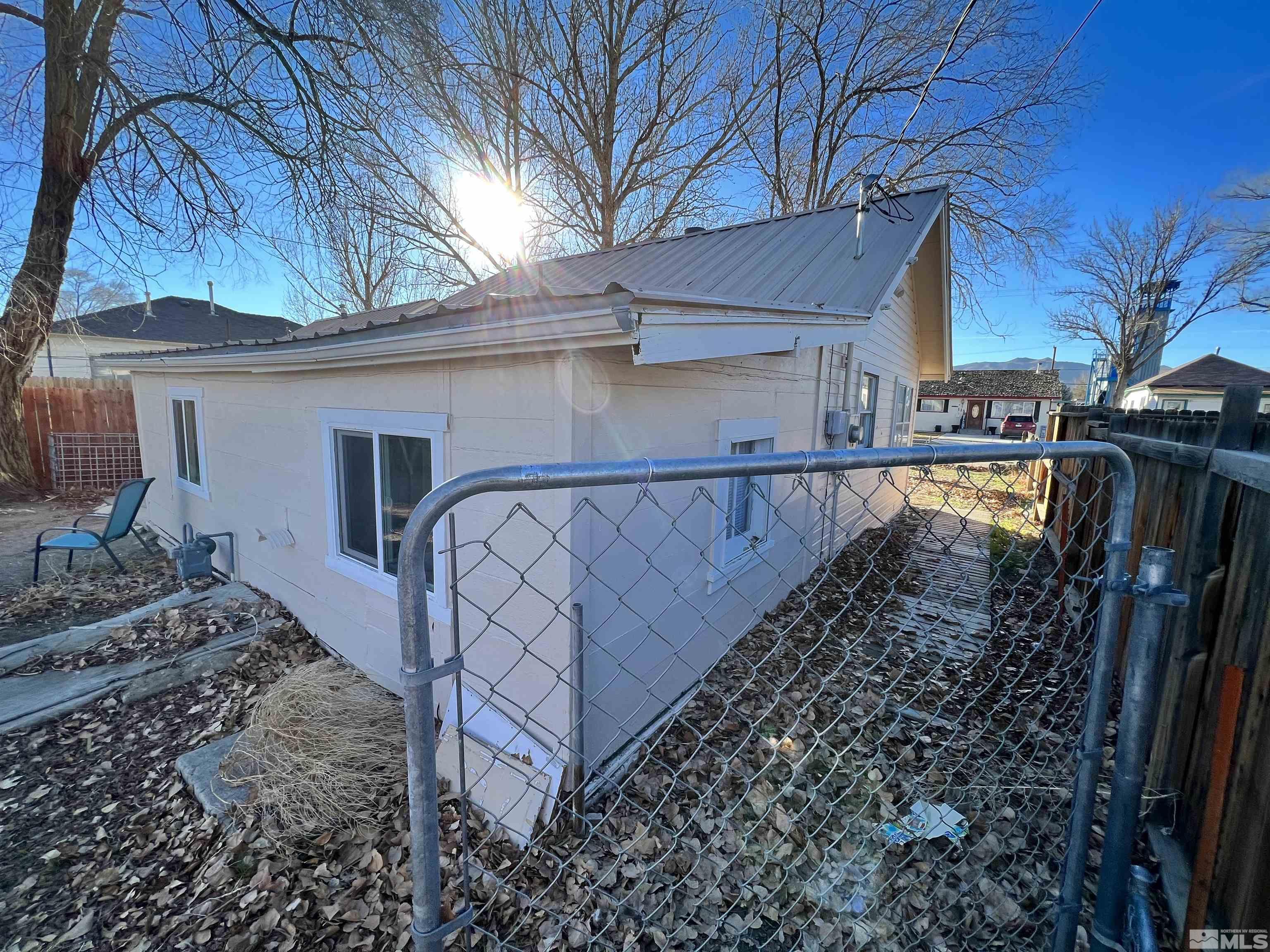 220 South Nevada Street, Unit 3 Yerington, NV 89447 - Photo 19 of 39 a view of a yard with wooden fence