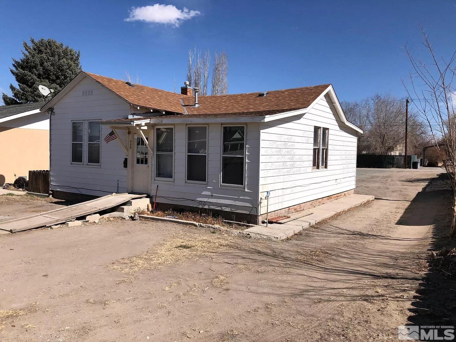 220 South Nevada Street, Unit 3 Yerington, NV 89447 - Photo 23 of 39 a view of a house with a yard