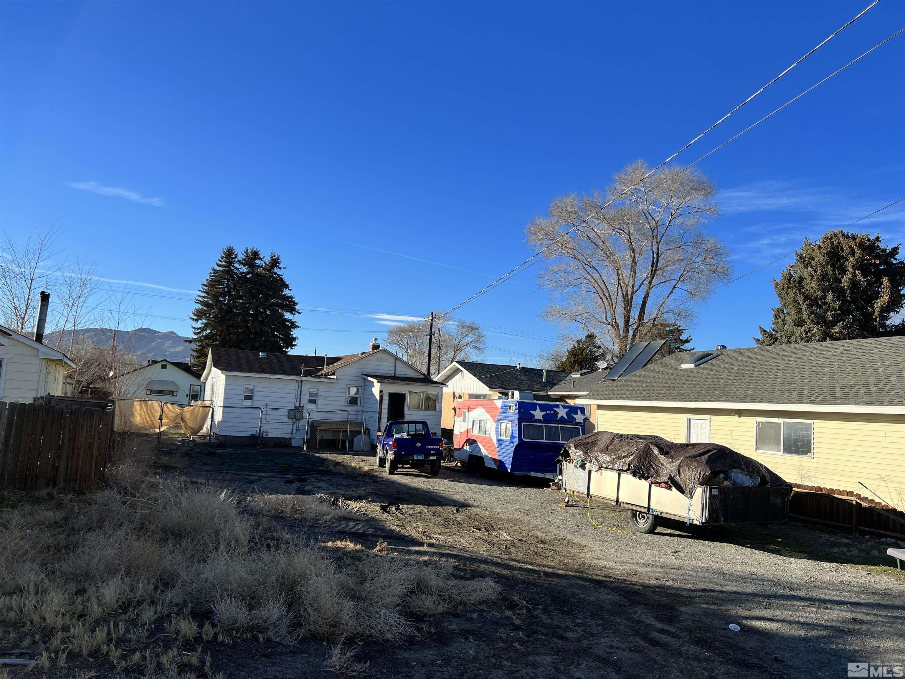 220 South Nevada Street, Unit 3 Yerington, NV 89447 - Photo 34 of 39 a view of a house with a yard