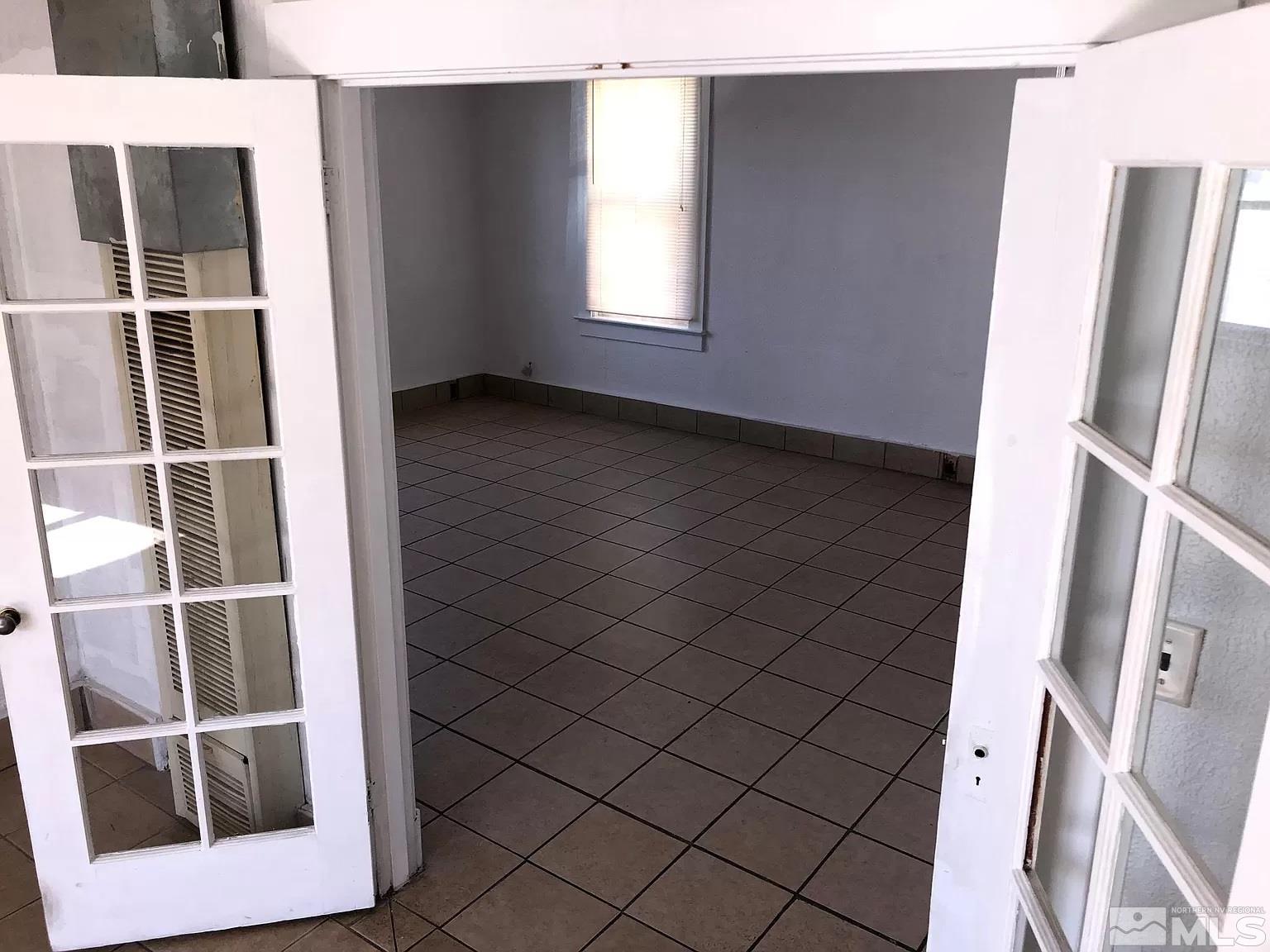220 South Nevada Street, Unit 3 Yerington, NV 89447 - Photo 36 of 39 a view of an empty room with a window