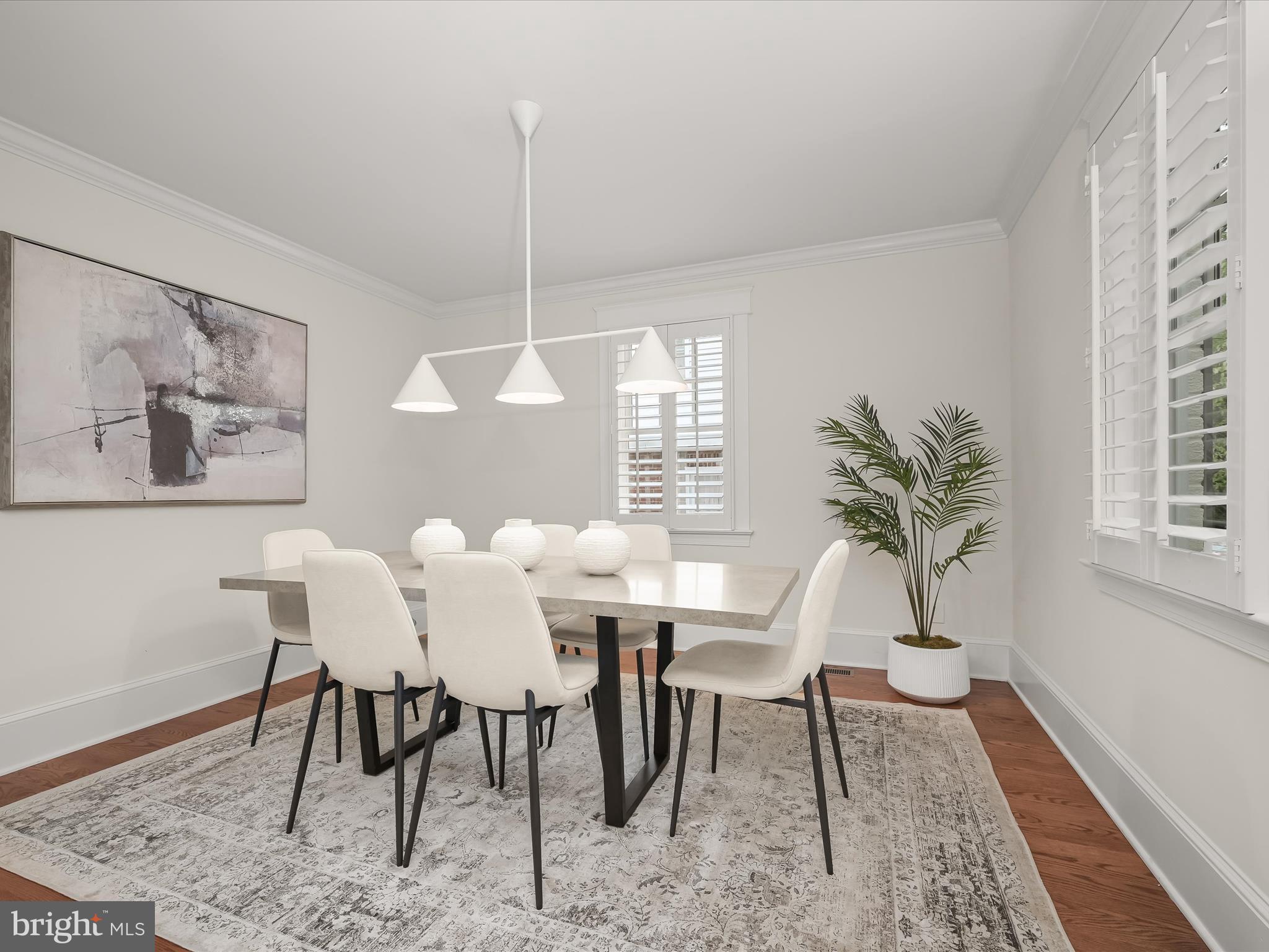 3118 17th Street North Arlington, VA 22201 - Photo 14 of 96 a view of a dining room with furniture window and wooden floor