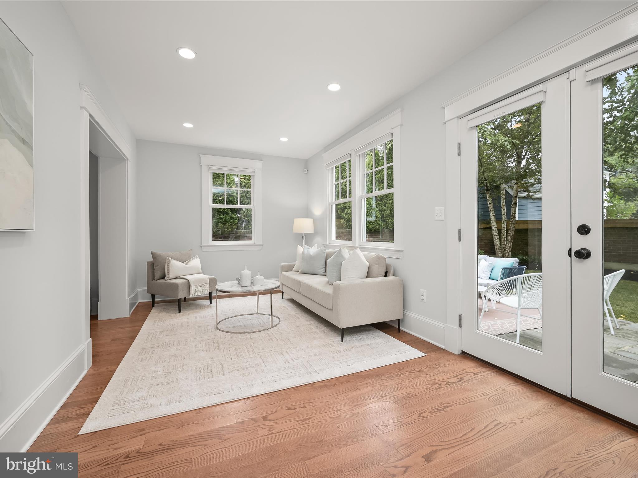 3118 17th Street North Arlington, VA 22201 - Photo 31 of 96 a living room with furniture and large windows
