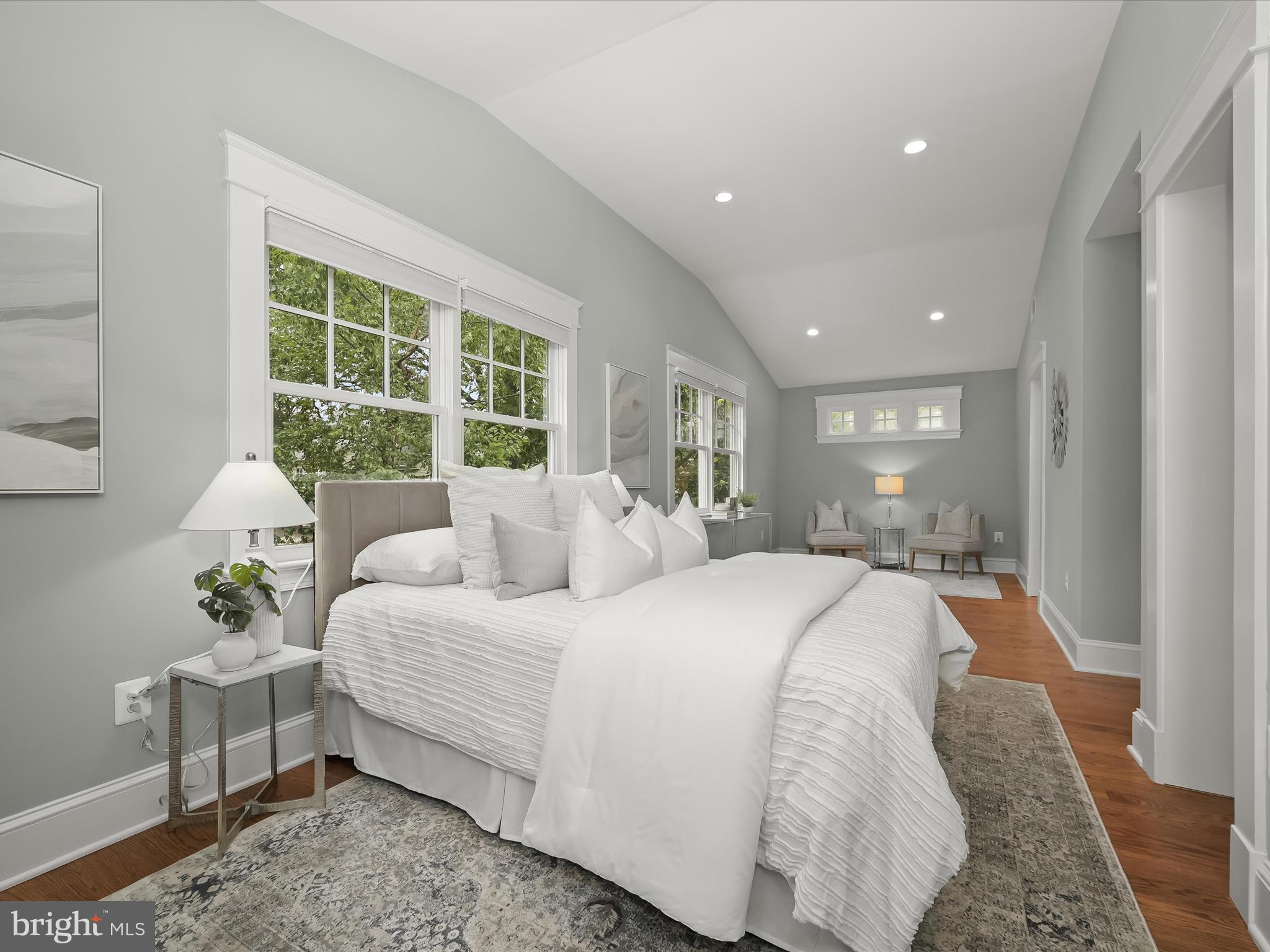 3118 17th Street North Arlington, VA 22201 - Photo 33 of 96 a spacious bedroom with a bed and a couch