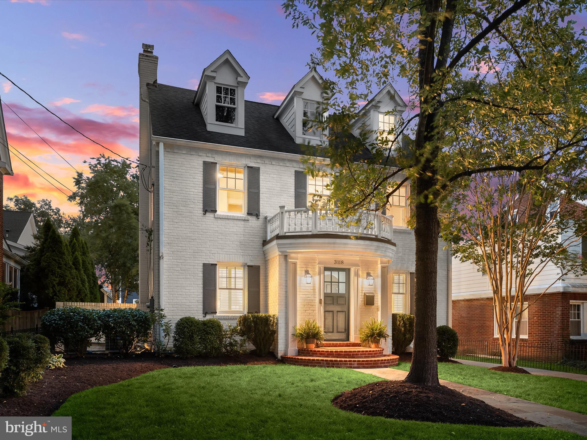 3118 17th Street North Arlington, VA 22201 - Photo 4 of 96 a front view of a house with a yard