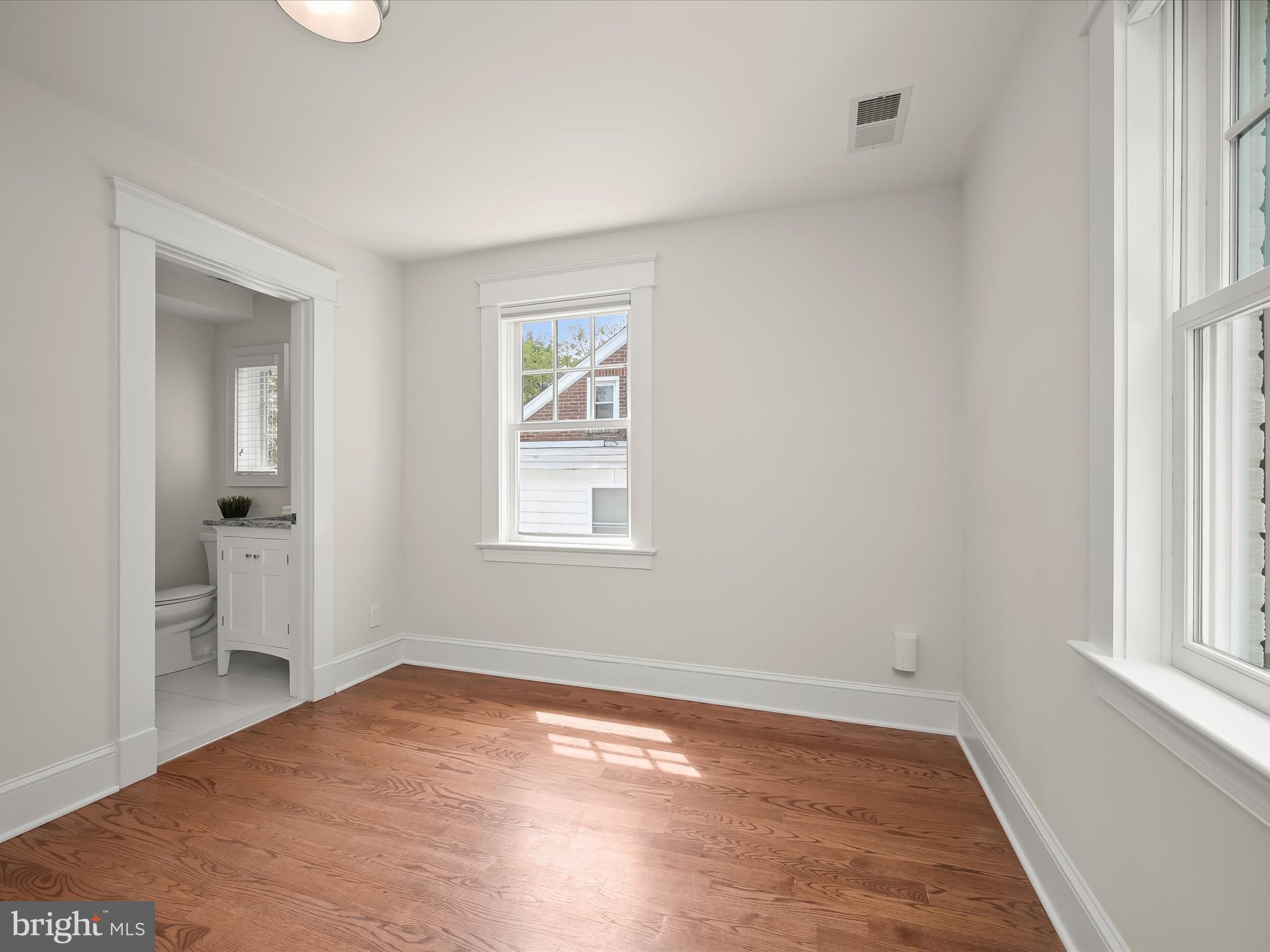 3118 17th Street North Arlington, VA 22201 - Photo 44 of 96 an empty room with windows and closet