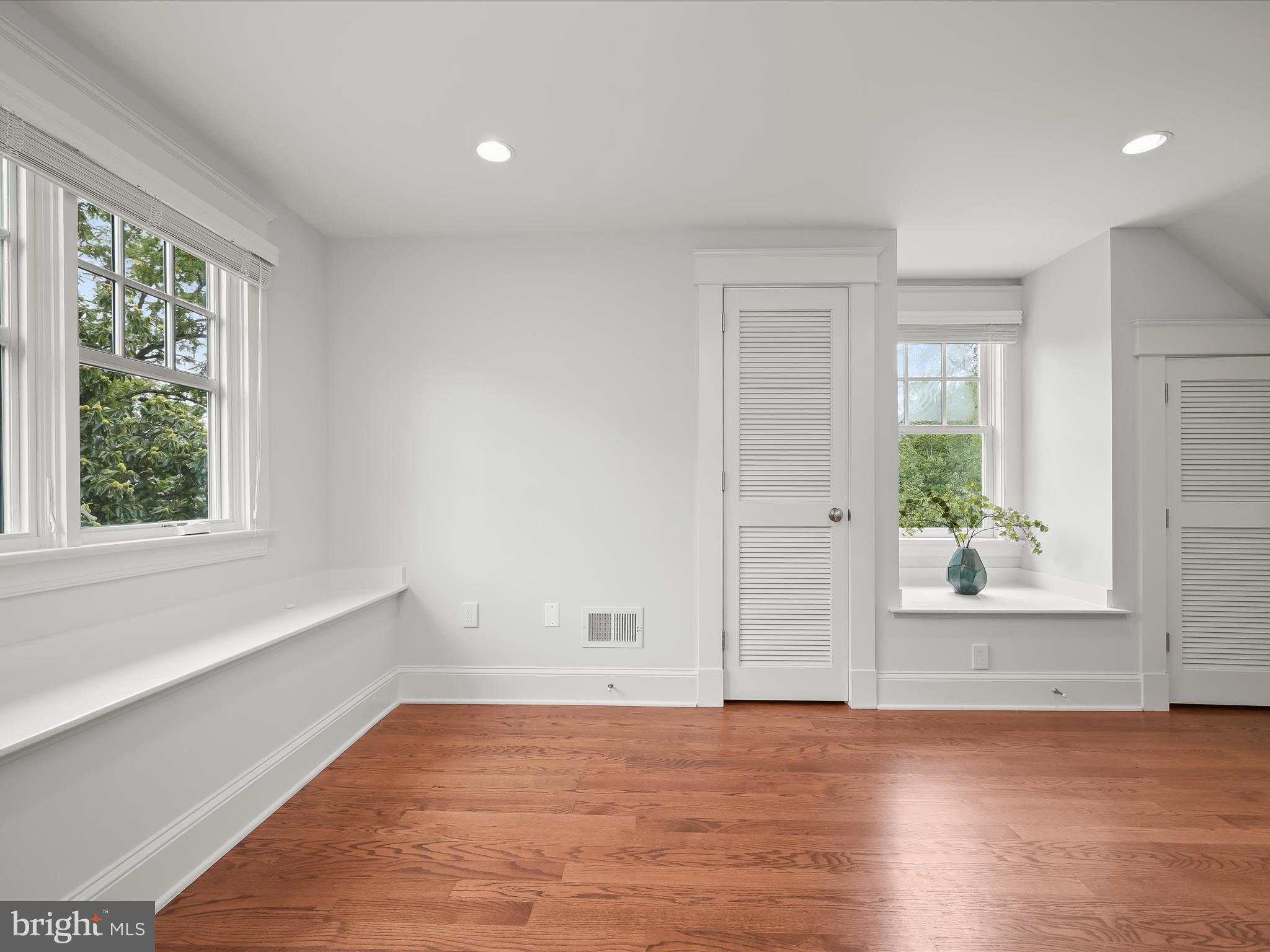 3118 17th Street North Arlington, VA 22201 - Photo 54 of 96 an empty room with wooden floor and windows
