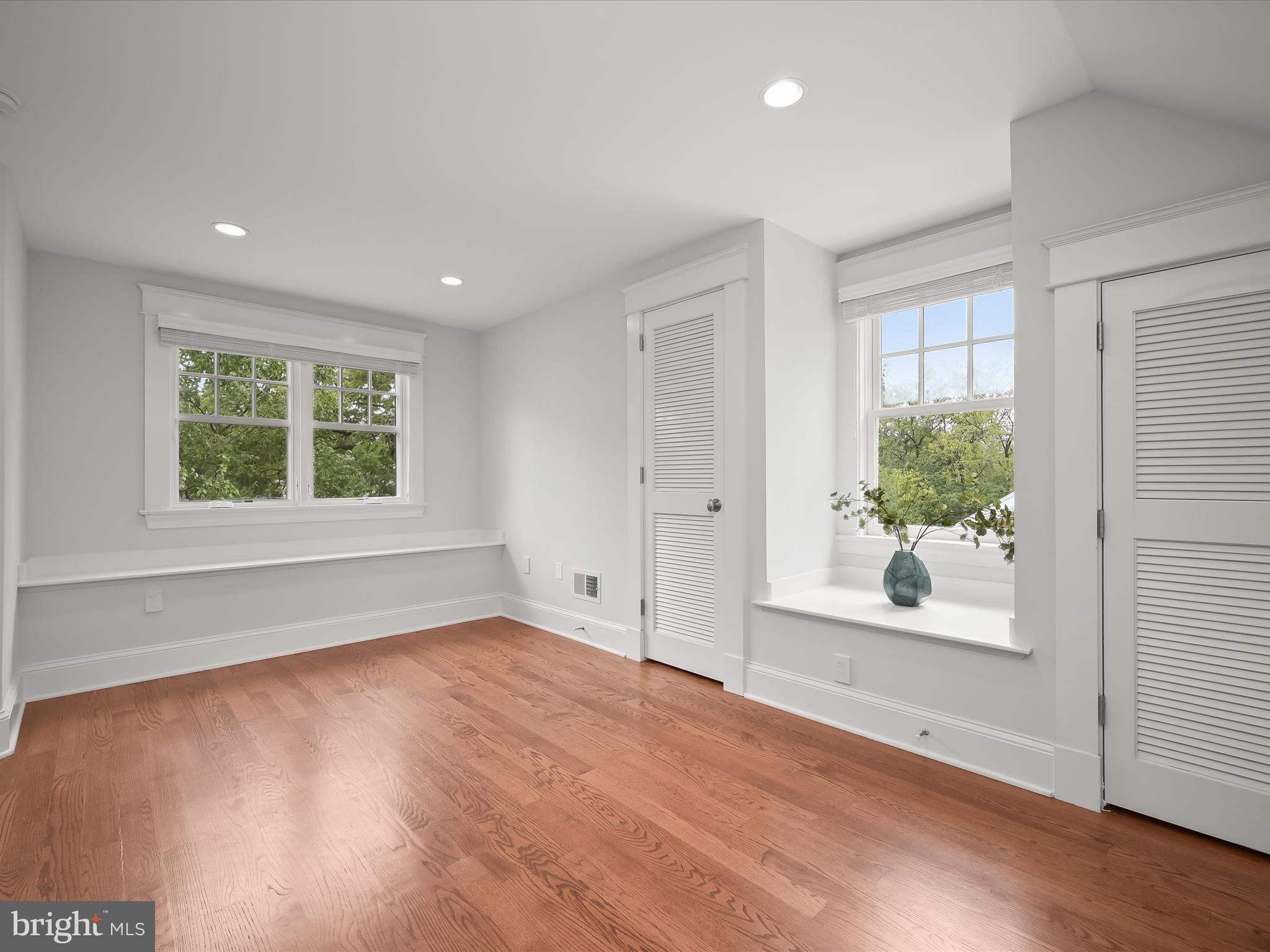 3118 17th Street North Arlington, VA 22201 - Photo 57 of 96 an empty room with wooden floor and windows