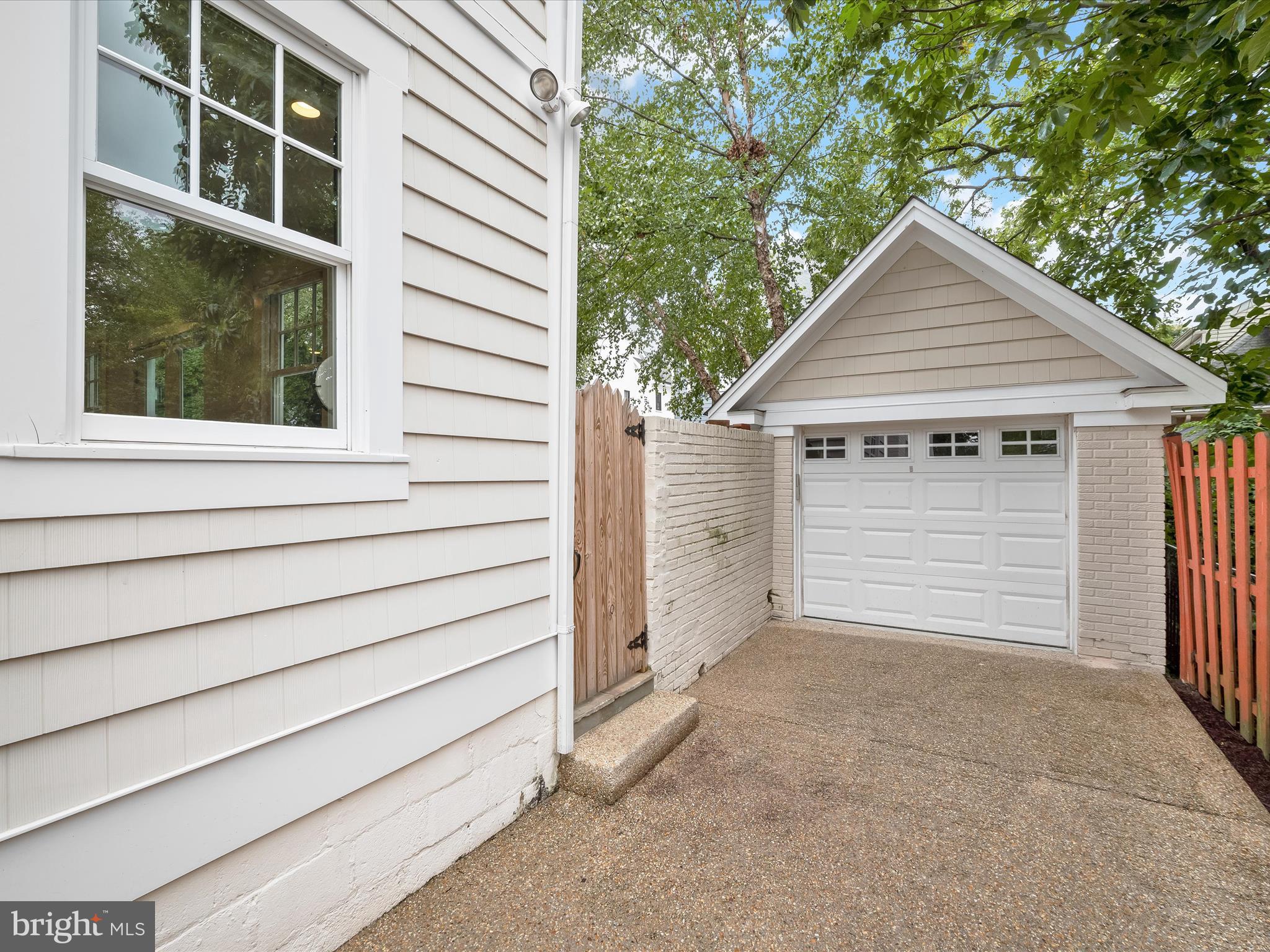 3118 17th Street North Arlington, VA 22201 - Photo 65 of 96 a view of house with garage and small yard