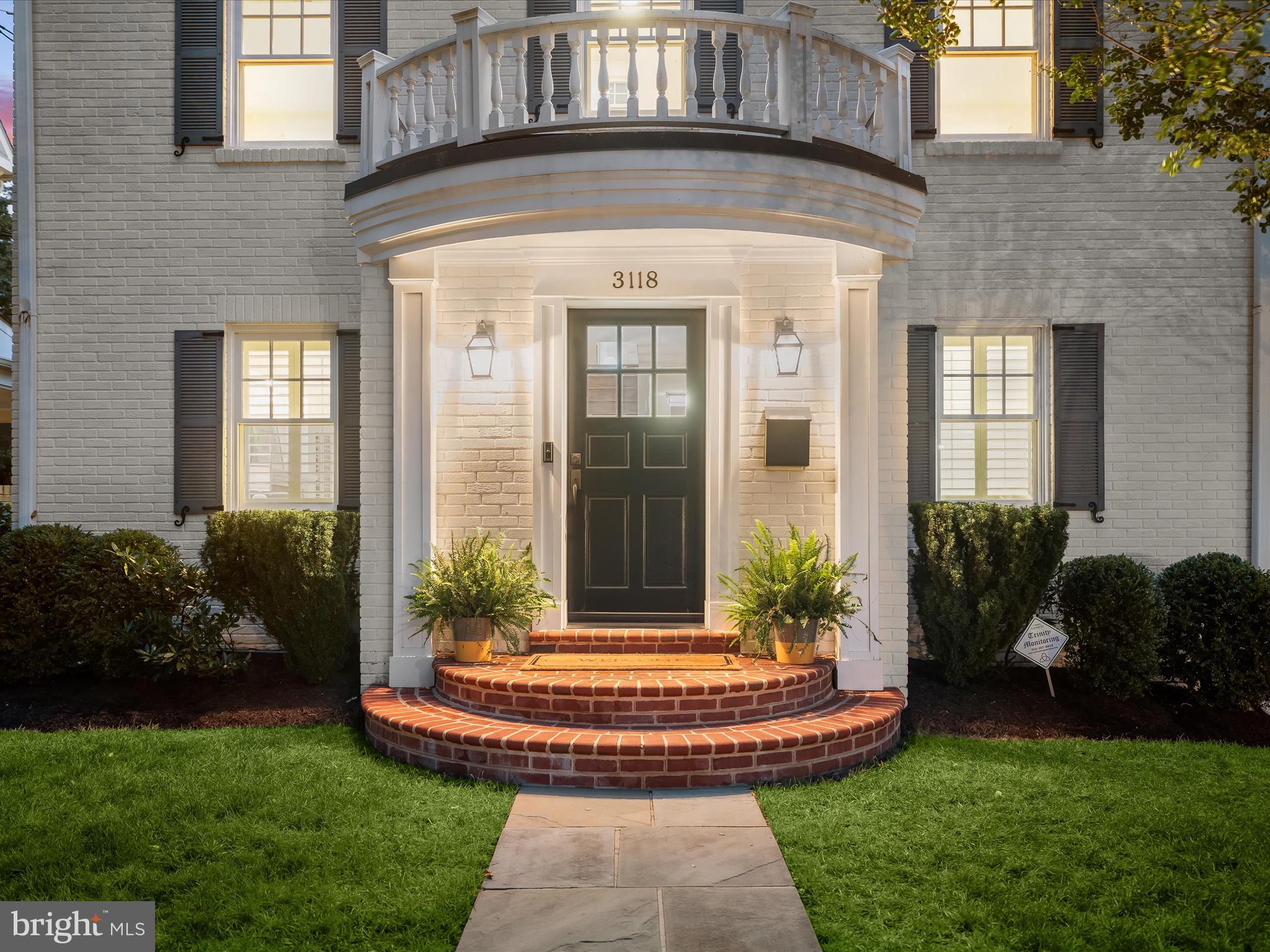3118 17th Street North Arlington, VA 22201 - Photo 9 of 96 a front view of a house with garden